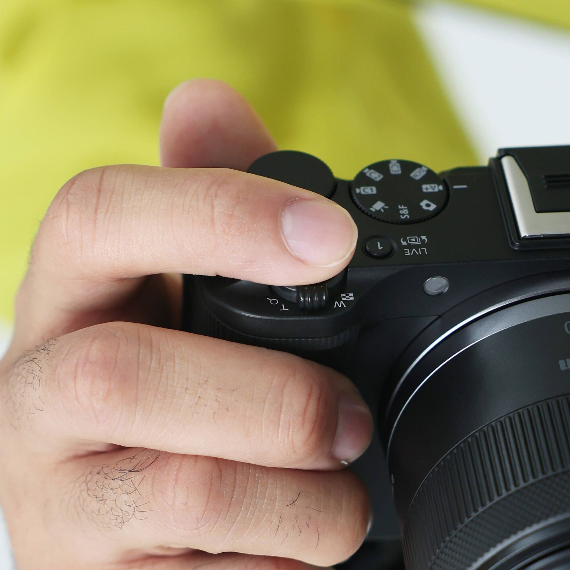 Canon EOS R50 V mirrorless camera with 14-30mm lens, front view — view 12
