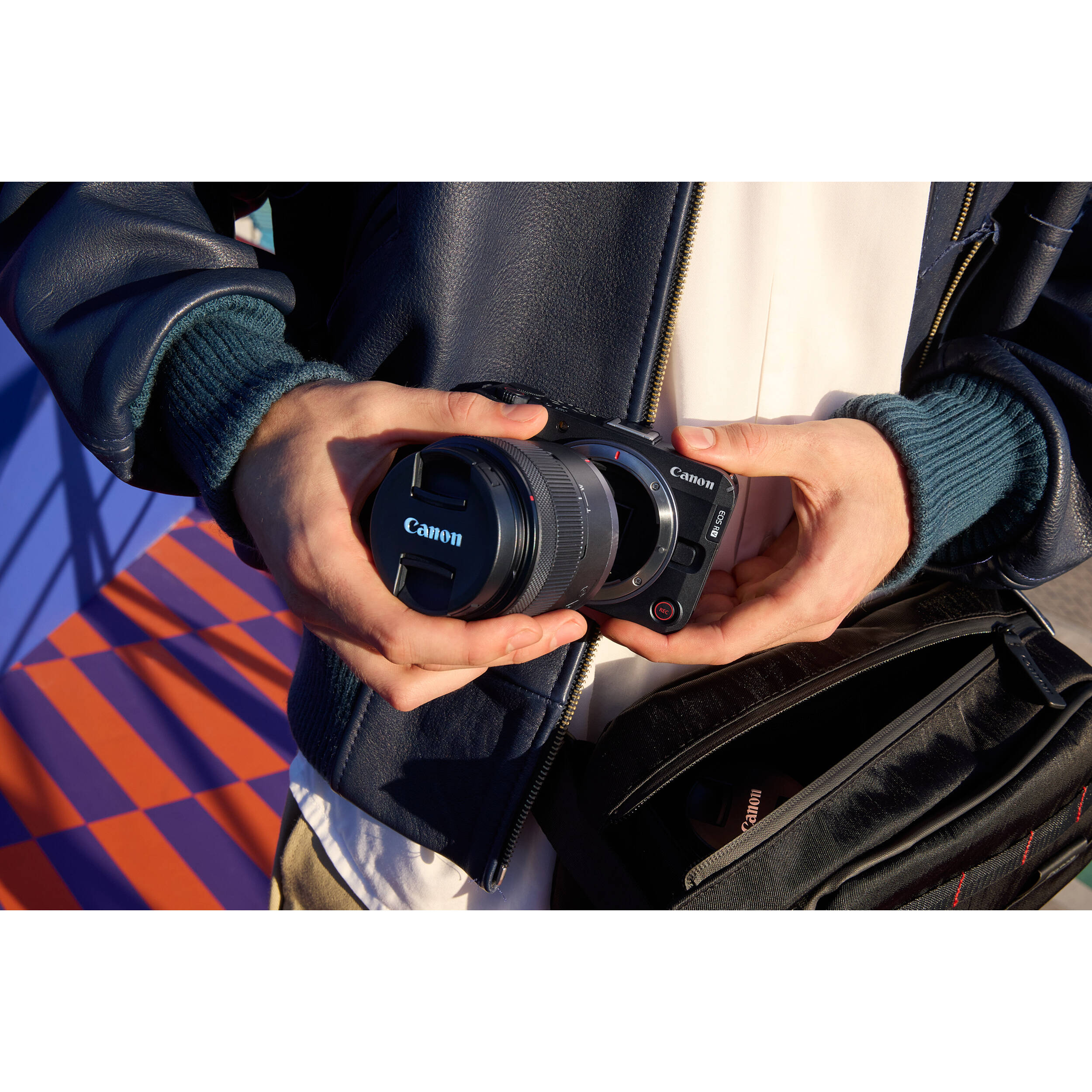 Canon EOS R50 V mirrorless camera with 14-30mm lens, front view — view 22