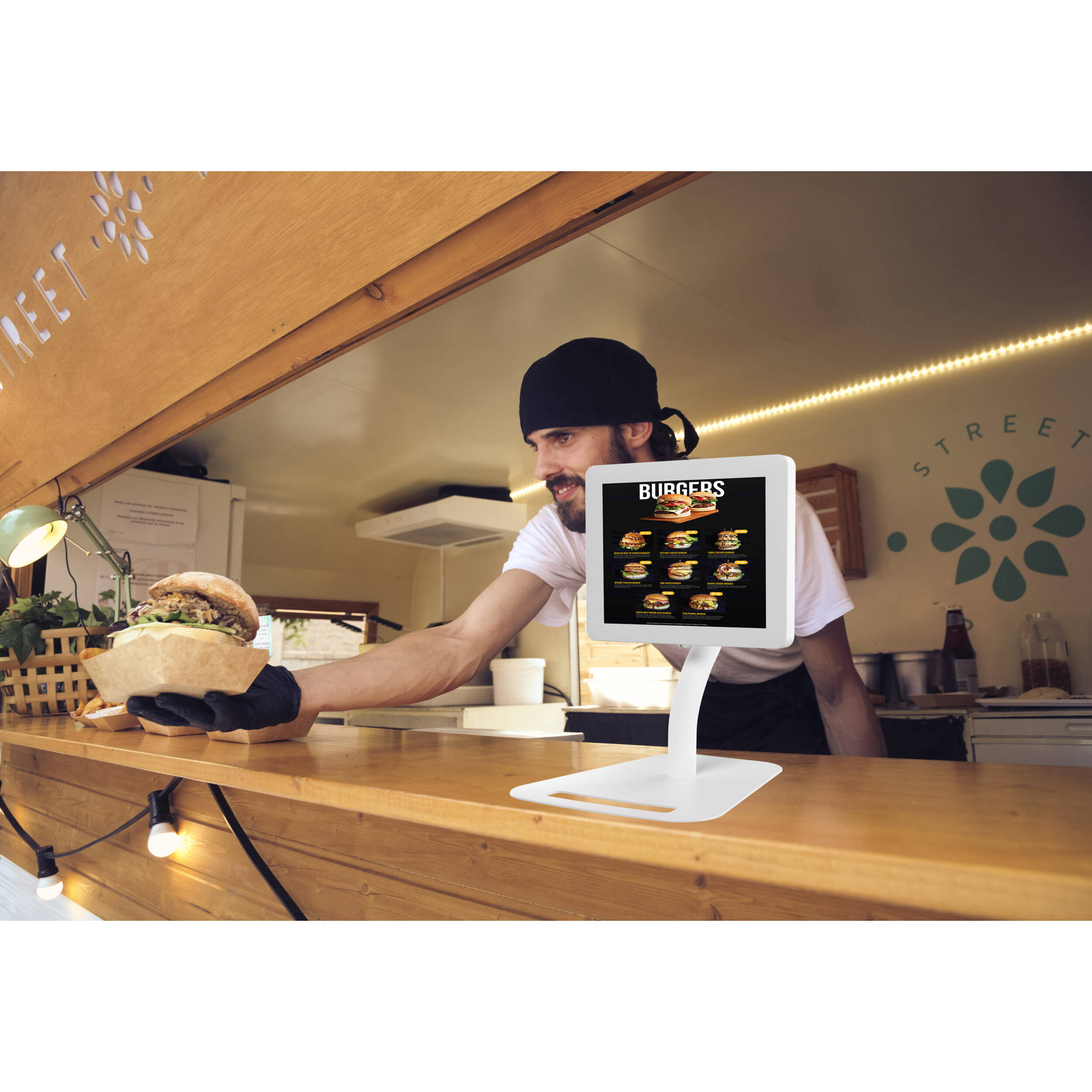 Height-adjustable floor-to-desk security kiosk for tablets in a public-facing workspace — view 13