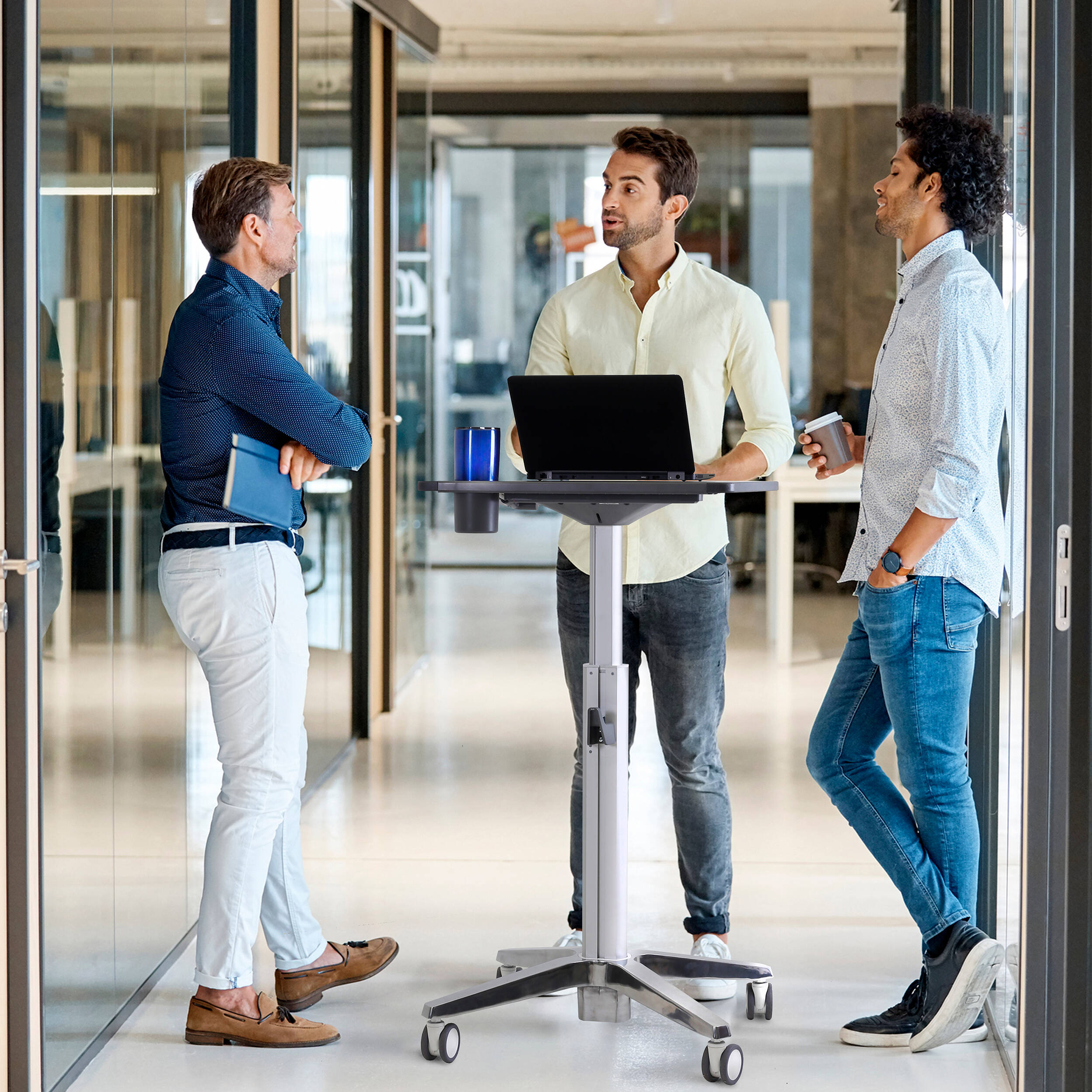 Ergotron LearnFit adjustable standing desk with locking casters and cup holder — view 8