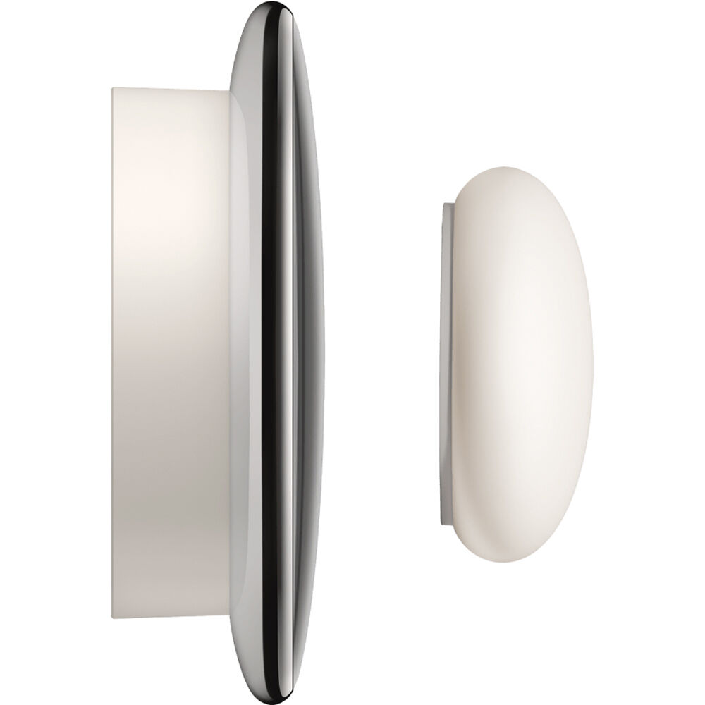 Google Nest Gen 4 Thermostat in Silver finish mounted on a wall — view 3