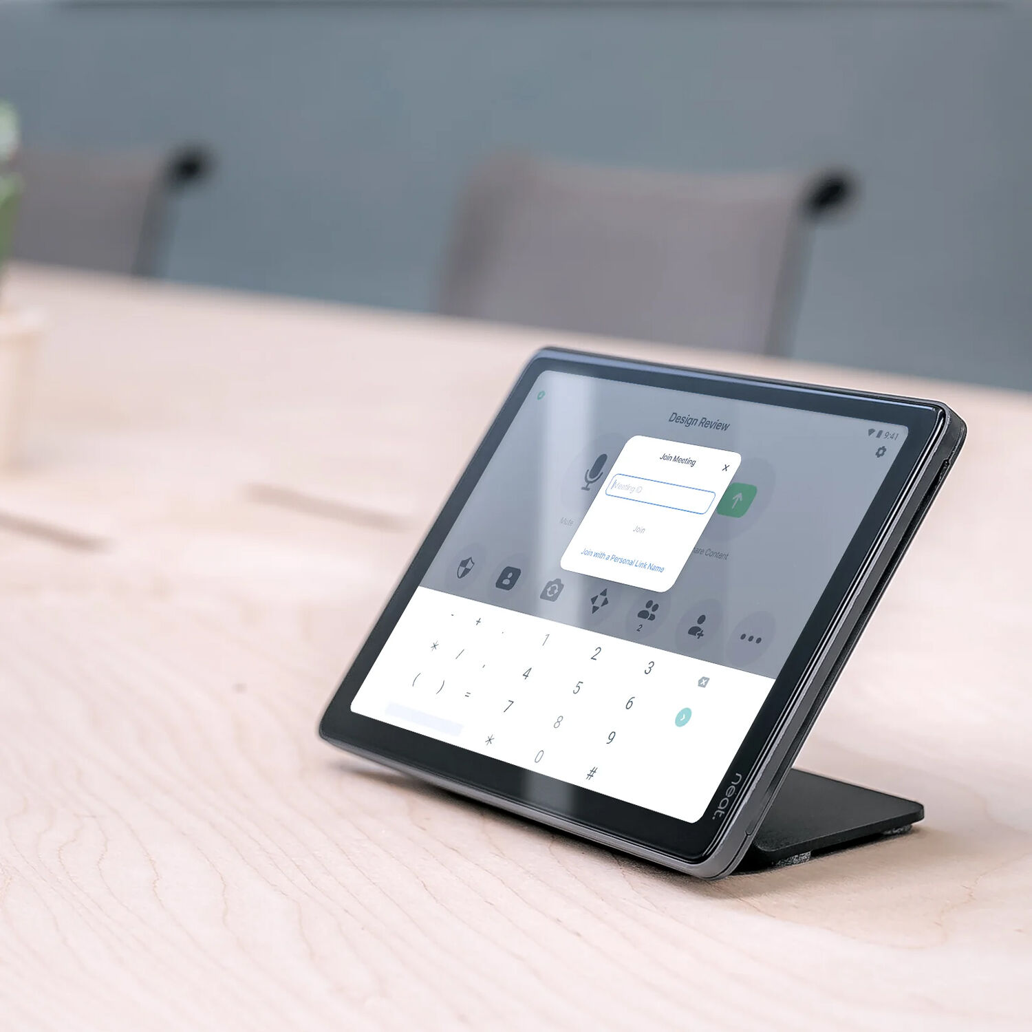 Black desktop stand for Neat Pad in a professional workspace — view 5