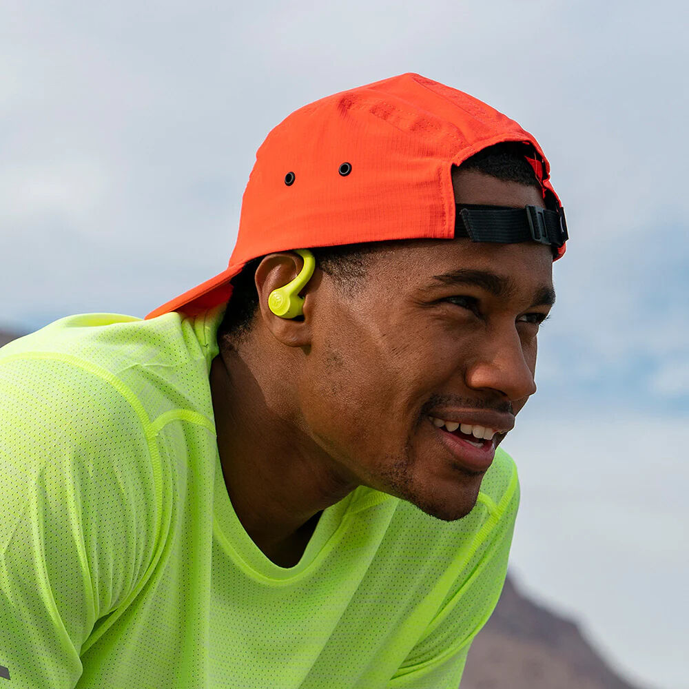 JLab GO Air Sport true wireless earbuds in neon with earhook sport design — view 7