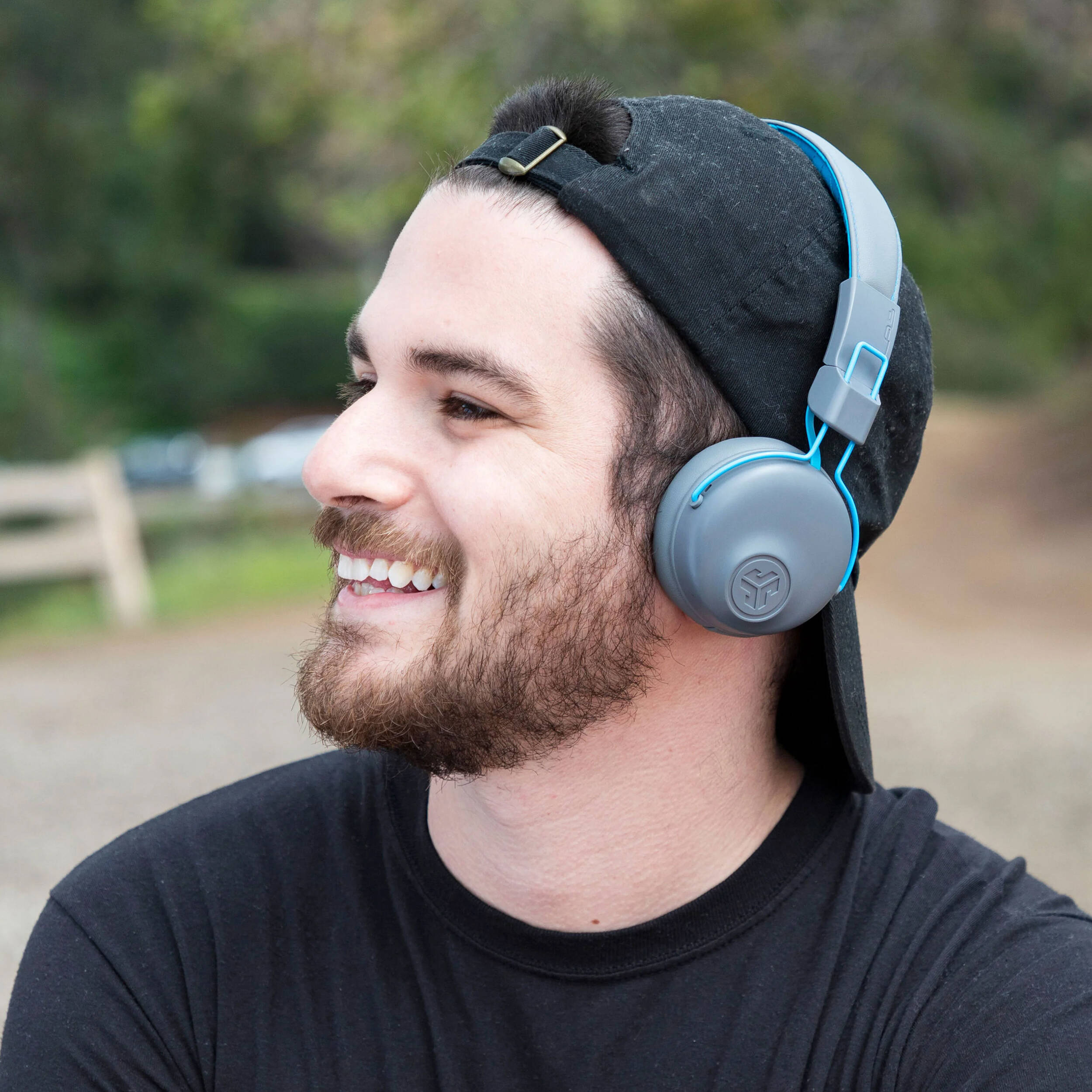 JLab Studio wireless on-ear headphones in gray and blue with over-the-head binaural design — view 4
