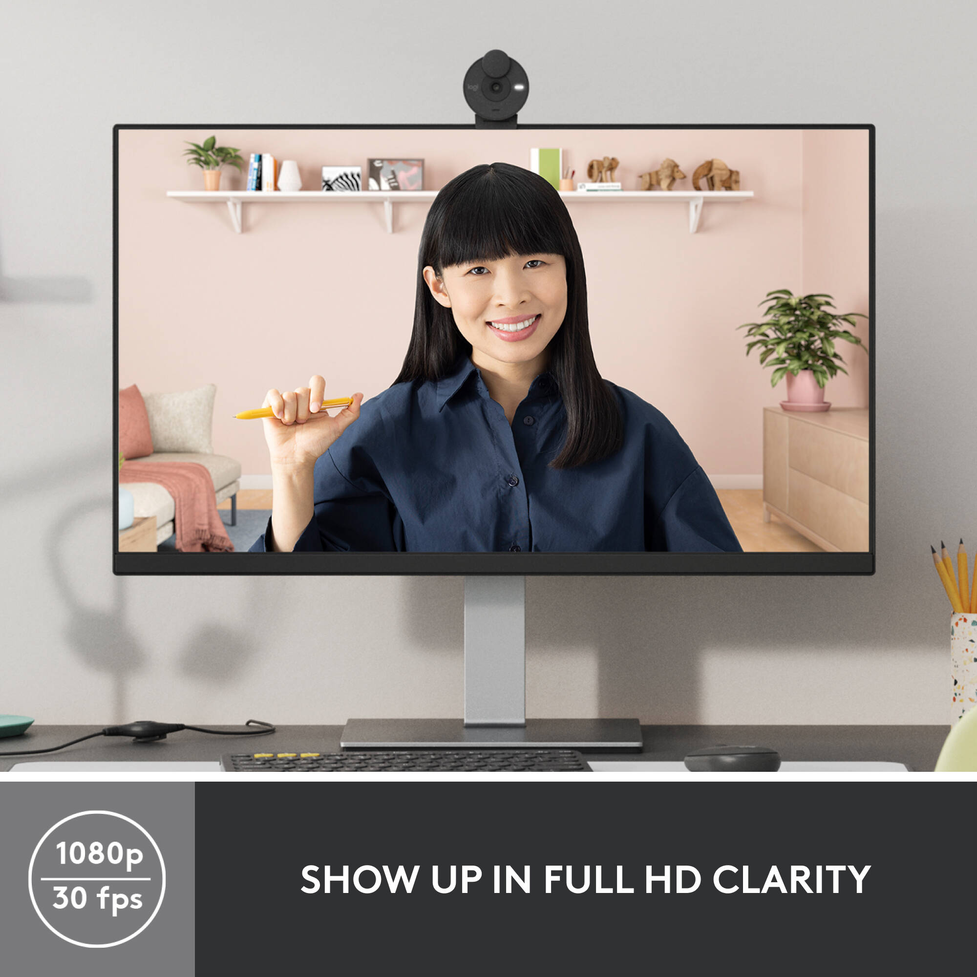 Logitech Brio 300 webcam in graphite with compact clip mount and privacy shutter — view 7