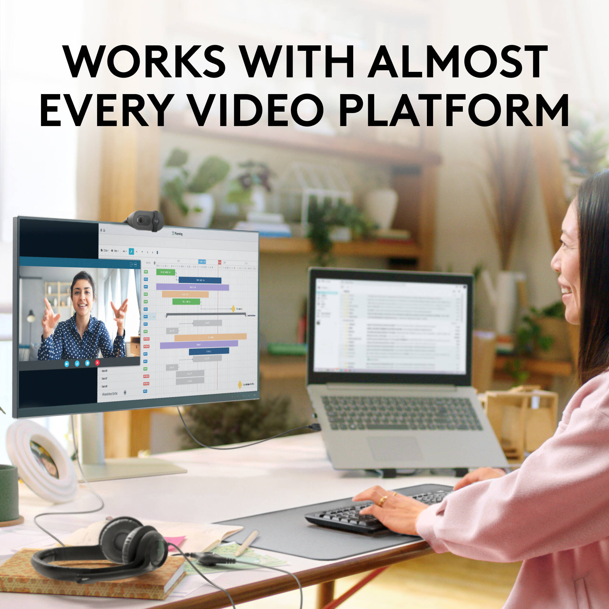 Logitech Brio 100 webcam in graphite with privacy shutter and clip-on mount — view 7