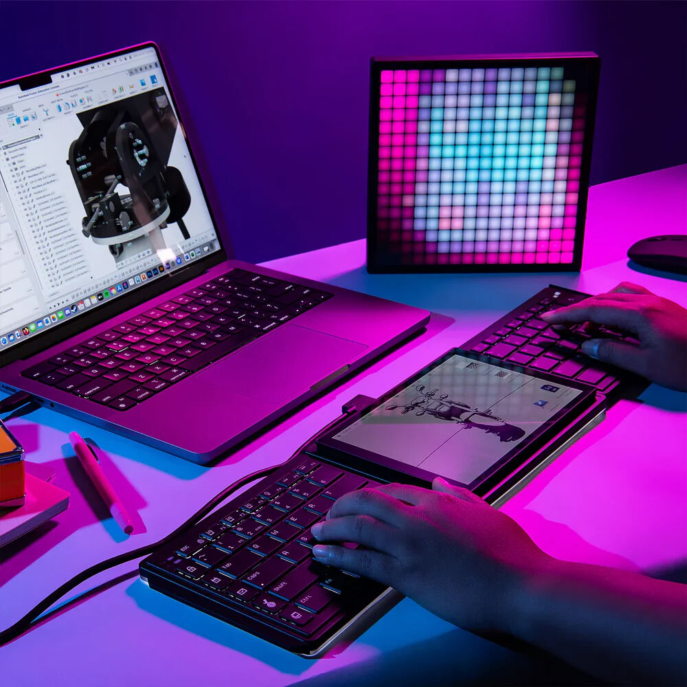 Mobile Pixels Tetra Split ergonomic keyboard with 8-inch touch LCD, backlit keys, and split layout — view 8