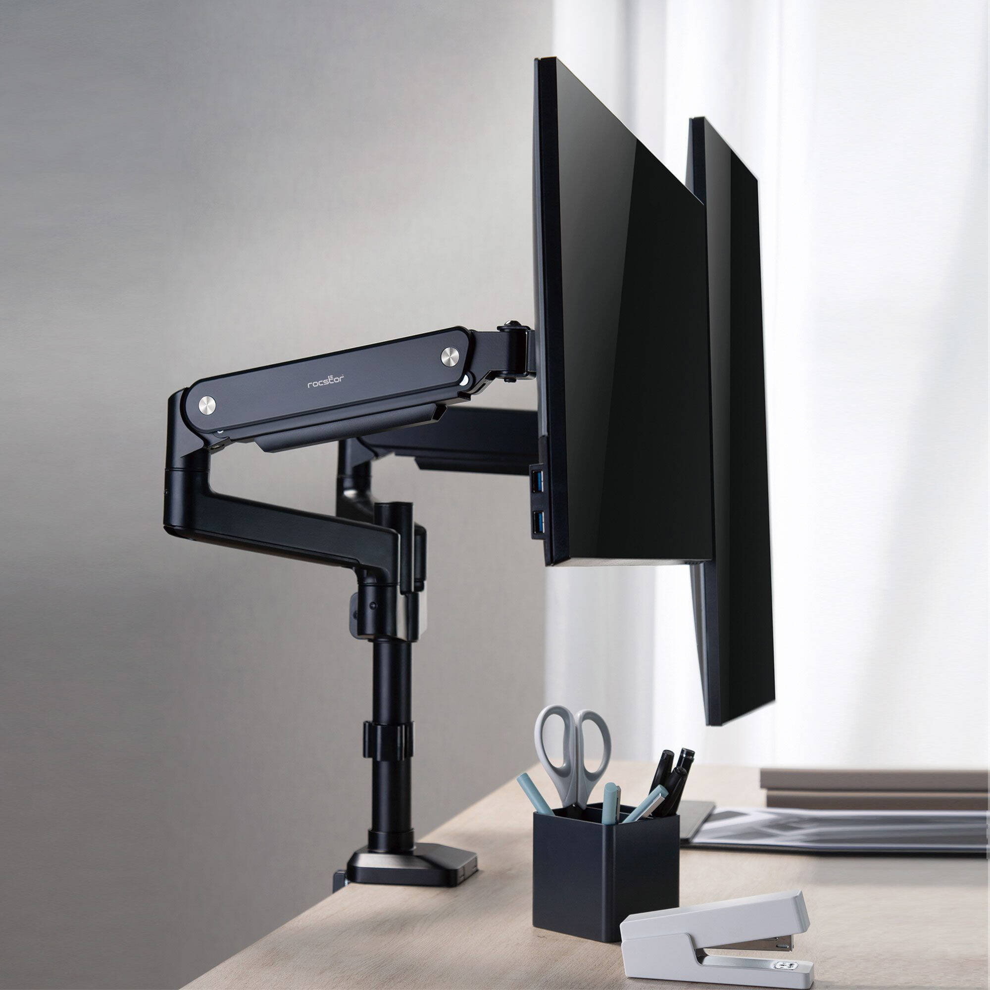 Rocstor ERGOREACH EP9 premium dual ergonomic monitor arm with C-clamp and grommet mounting — view 10