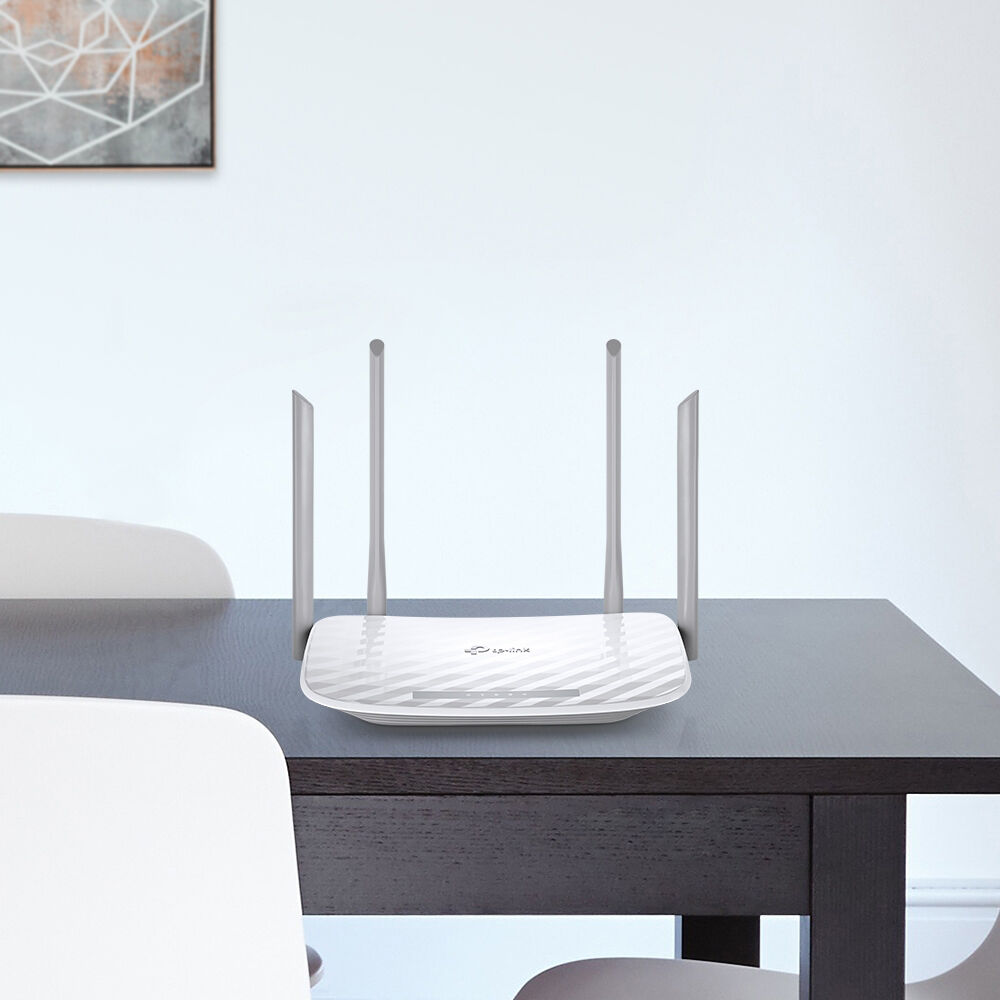 TP-Link Archer A54 AC1200 dual band Wi-Fi router desktop model with Ethernet ports — view 4