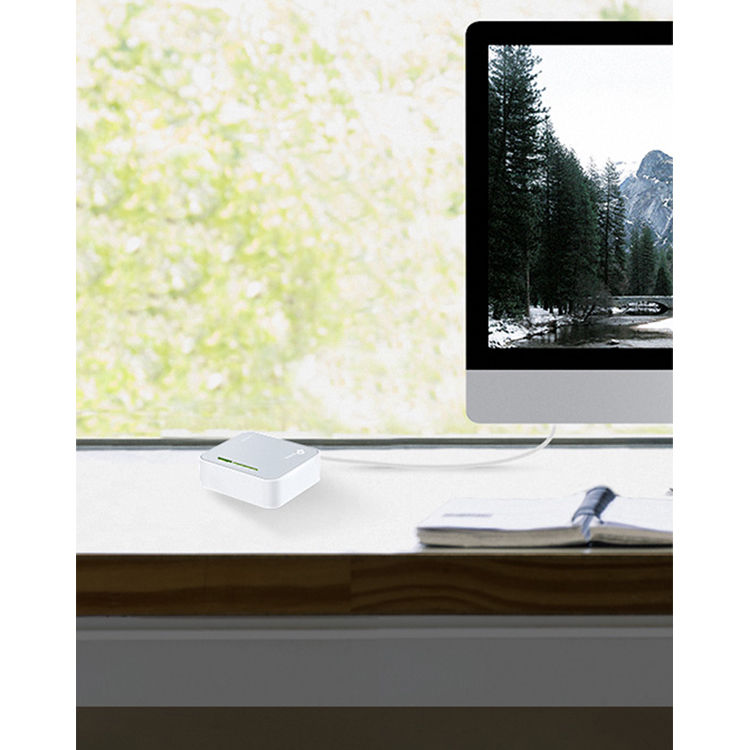 TP-Link AC750 portable Wi-Fi travel router TL-WR902AC in compact white enclosure — view 8