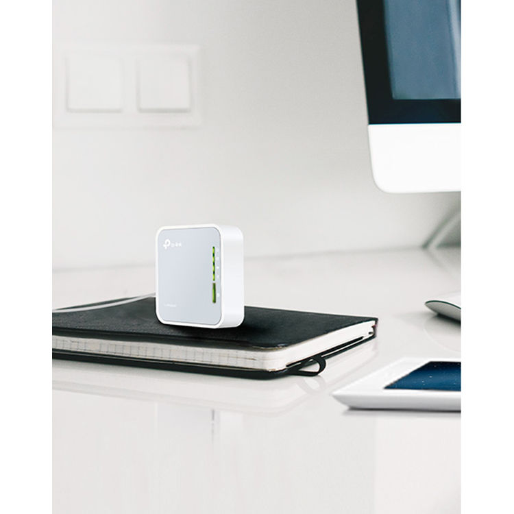 TP-Link AC750 portable Wi-Fi travel router TL-WR902AC in compact white enclosure — view 9